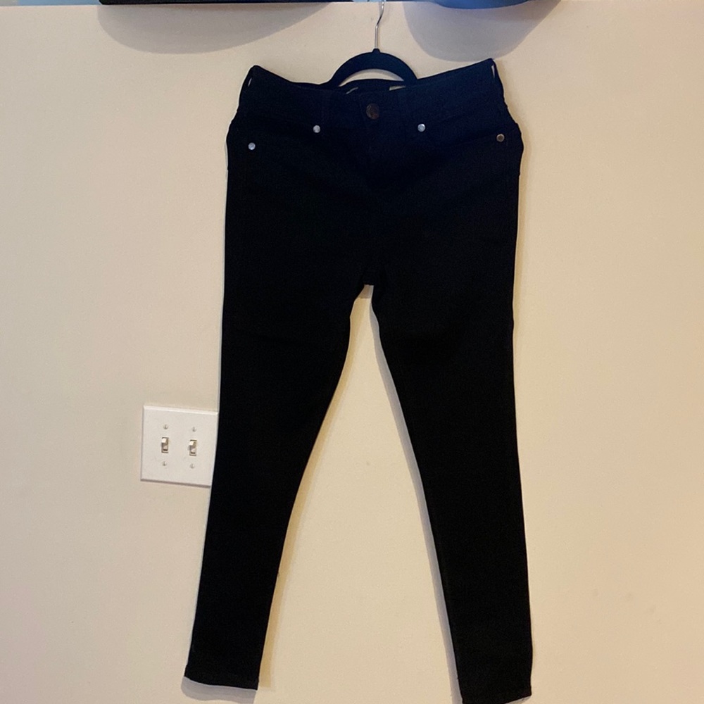 Black skinny leg jeans by Seven